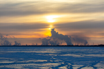 Wall Mural - Smoke from the chimneys of a steel plant in winter