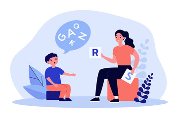 Wall Mural - speech therapist showing letters to little boy with disorder. speech therapy session with child flat