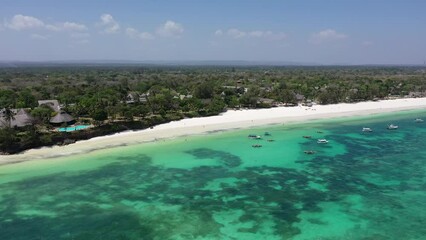 Wall Mural - Drone Coastline Diani beach landscape Kenyan African Sea  aerial 4k waves blue indan ocean tropical mombasa turquoise white sand East Africa palms paradise view Wood boats on water kite surfing