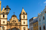 Fototapeta Miasto - Facade of old and historic churches and houses in colonial and baroque style in the tourist center of Pelourinho, city of Salvador, Bahia