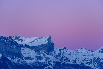  La Chaine des Fiz at dusk in Europe, France, Rhone Alpes, Savoie, Alps, in winter, on a sunny day.