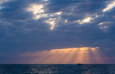 Wall Mural - Amazing sea sunset, the sun, waves, clouds