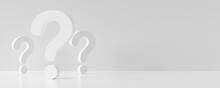 Group Of Big And Small White Question Mark Signs On White Room Background With Copy Space, Idea, Solution Or Question Or Communication Business Concept