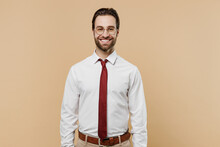 Young Caucasian Smiling Successful Employee Business Man Corporate Lawyer 20s Wear Classic Formal White Shirt Red Tie Glasses Work In Office Isolated On Plain Beige Color Background Studio Portrait.