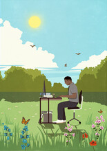 Businessman Working At Desk In Sunny, Idyllic Springtime Meadow
