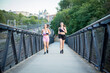 © luisrojasstock - couple of young women running in sportswear