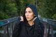 © luisrojasstock - portrait of sportswoman in hooded sweatshirt