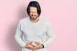 © Krakenimages.com - Middle age caucasian man wearing casual clothes with hand on stomach because indigestion, painful illness feeling unwell. ache concept.