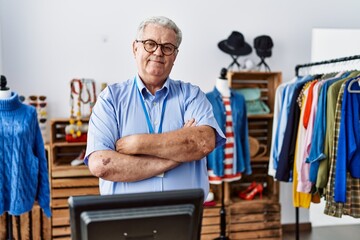 Sticker - Senior man with grey hair working as manager at retail boutique happy face smiling with crossed arms looking at the camera. positive person.