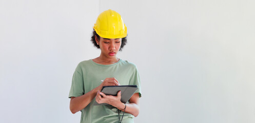 Professional black femal engineers and inspectors investigating the neatness of houses under construction in housing projects.