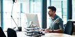 © Jadon Bester/peopleimages.com - The successful stay consistent. Shot of a focused young businessman using a computer at his desk in a modern office.