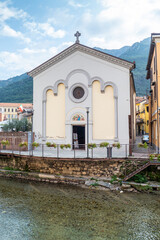 Poster - The historic center of Omegna with beautiful buildings near the river