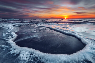 Poster - A long exposure of the colorful winter sunset at the Baltic Sea, Lithuania