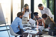 © Ruan Jordaan/peopleimages.com - Strategy session time for the team. Shot of a group of businesspeople having a meeting in a boardroom.