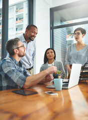 Aufkleber - Working together to get the task done. Shot of businesspeople working together in the office.