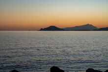 Sunset At Sea. Sea Landscape. Variety Of Colors And Hues Of The Sun. Bagnoli, Naples, Italy.