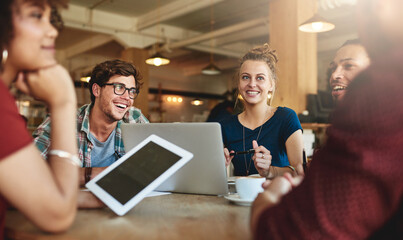 Poster - Study groups are the perfect place to find new perspectives. Shot of students studying in a coffee shop.