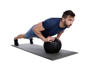 Sticker - Athletic man doing exercise with medicine ball isolated on white