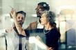 © Diane Munro/peopleimages.com - They never fall short of big ideas. Cropped shot of a group of businesspeople brainstorming with notes on a glass wall in an office.