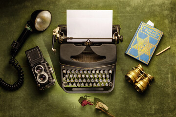 Wall Mural - Still life with a vintage typewriter, camera, flash and other things.