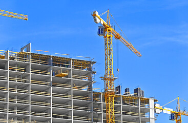 Wall Mural - Crane and highrise construction site