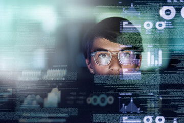 Shes a genius programmer. A young nerdy computer programmer looking through data, software or network interface. A female software developer coding and concentrating