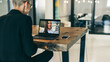© Jacob Lund - Modern businesswoman attending a video conference with her global partners