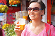 © aletia2011 - Yougn woman with glass of fresh fruit juice