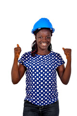 Wall Mural - young happy female engineer making a winning gesture smiling.