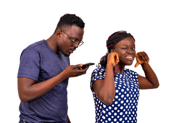 Wall Mural - jealous man checking messages in his girlfriend's mobile phone.