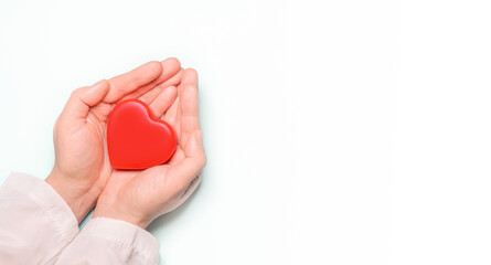 Sticker - Red heart in Doctor 's hands on white background. Healthcare and hospital medical concept,organ donation concept.Symbolic of Valentine day.Heart day.?opy space.