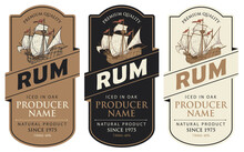 Set of three vector labels for rum in a figured frames with old sailing ships and inscriptions in retro style. Collection of strong alcoholic beverages. Premium quality, iced in oak