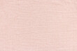 Soft pink fabric.with puckered texture. Abstract background. Fashion and clothes design trends concept