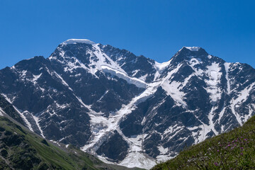Wall Mural - Greater Caucasus Range.  Glacier Seven on mount Donguz-Orun in Elbrus region. Summer landscape