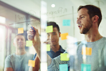 Aufkleber - Planning is the first step. Cropped shot of a group of young designers planning on a glass board.