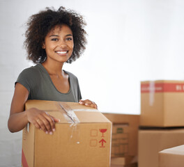 Sticker - Heres to a new start. Shot of a young woman moving into her new house.