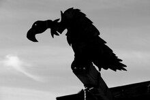 Monochrome Silhouette Of A Vulture On A Gallows In The Wild West Ghost Town Of Calico, San Bernardino County, California, USA
