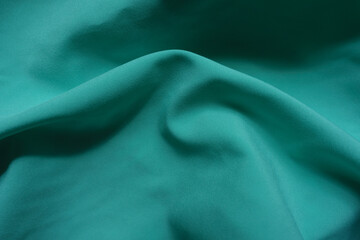 Rumpled simple thin bluish green chiffon fabric