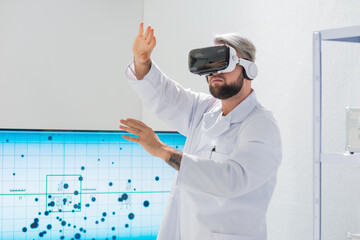 Canvas Print - Genetic engineers are using Virtual Reality technology. Professional team of scientists is working on a vaccine in a modern scientific research laboratory. Science of future.