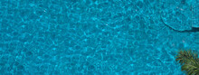 Swimming Pool Blue Water In Summer Top View Angle. Aerial View Images Of Swimming Pool In A Sunny Day Which Suitable For Sport Or Relax On Vacation Time Or Workout For Burn Some Calories In Holiday.