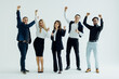 © F8  \ Suport Ukraine - Happy business group. Young business team celebrating victory isolated on white background