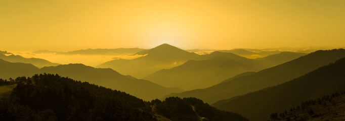 Wall Mural - Mountains at sunset. Panoramic summer view. Fantastic evening sunset light, fabulous nature mountais image.