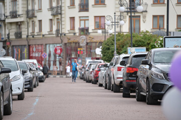 Sticker - Cars parked in line on city street side. Urban traffic concept