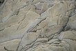 Light gray rough grainy stone texture background. High quality photo