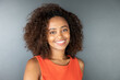© PICHA - portrait of a woman with curly hair