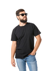 Wall Mural - Handsome man with sunglasses in black t-shirt on white background