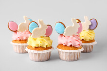 Yummy Easter Cupcakes On Grey Background