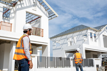 Poster - Group of construction engineers working together in construction site planning for new house,House improvement concept.
