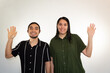 © Antonio Tanaka - young Hispanic heterosexual couple happy and smiling on a white background