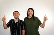 © Antonio Tanaka - young Hispanic heterosexual couple happy and smiling on a white background